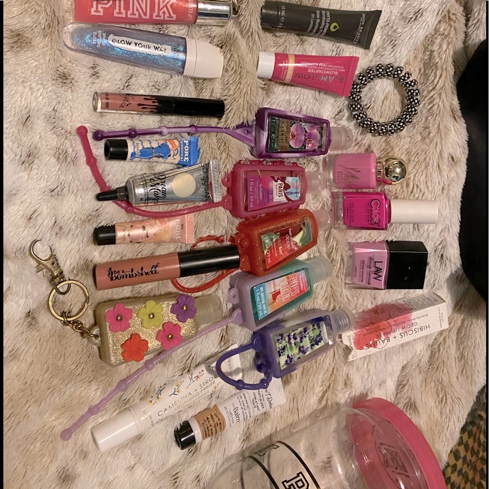Pink clear container filled with different goodies